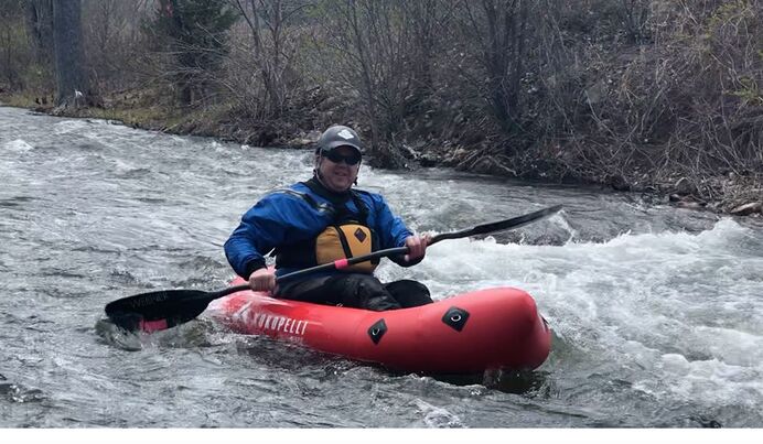 Kayaking Rapid Creek